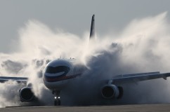 sukhoi_superjet_100_aircraft_smoke_dust_98001